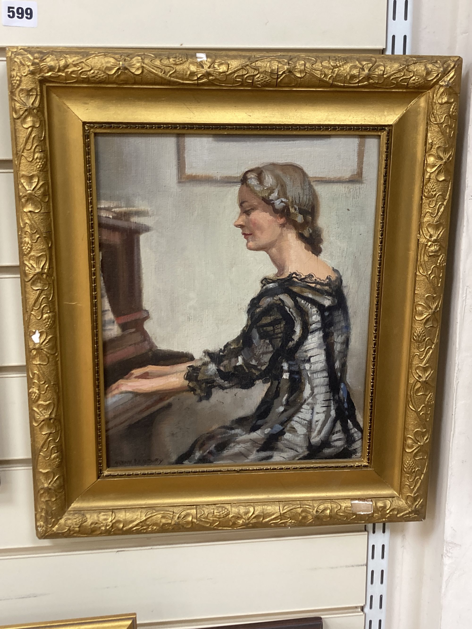 Arthur Royce Bradbury (1892-1977), oil on board, Lady playing the piano, signed, 34 x 27cm